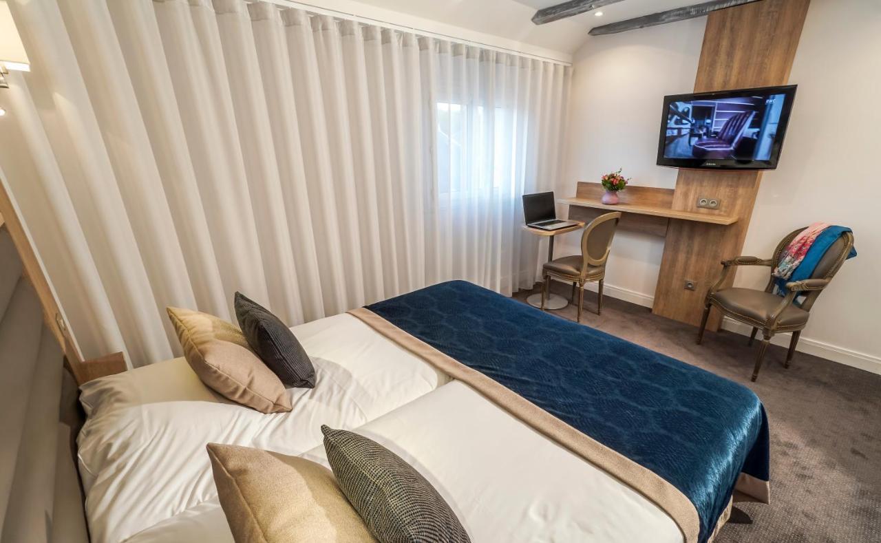 Logis - Le Christina Hotel Bourges Bagian luar foto