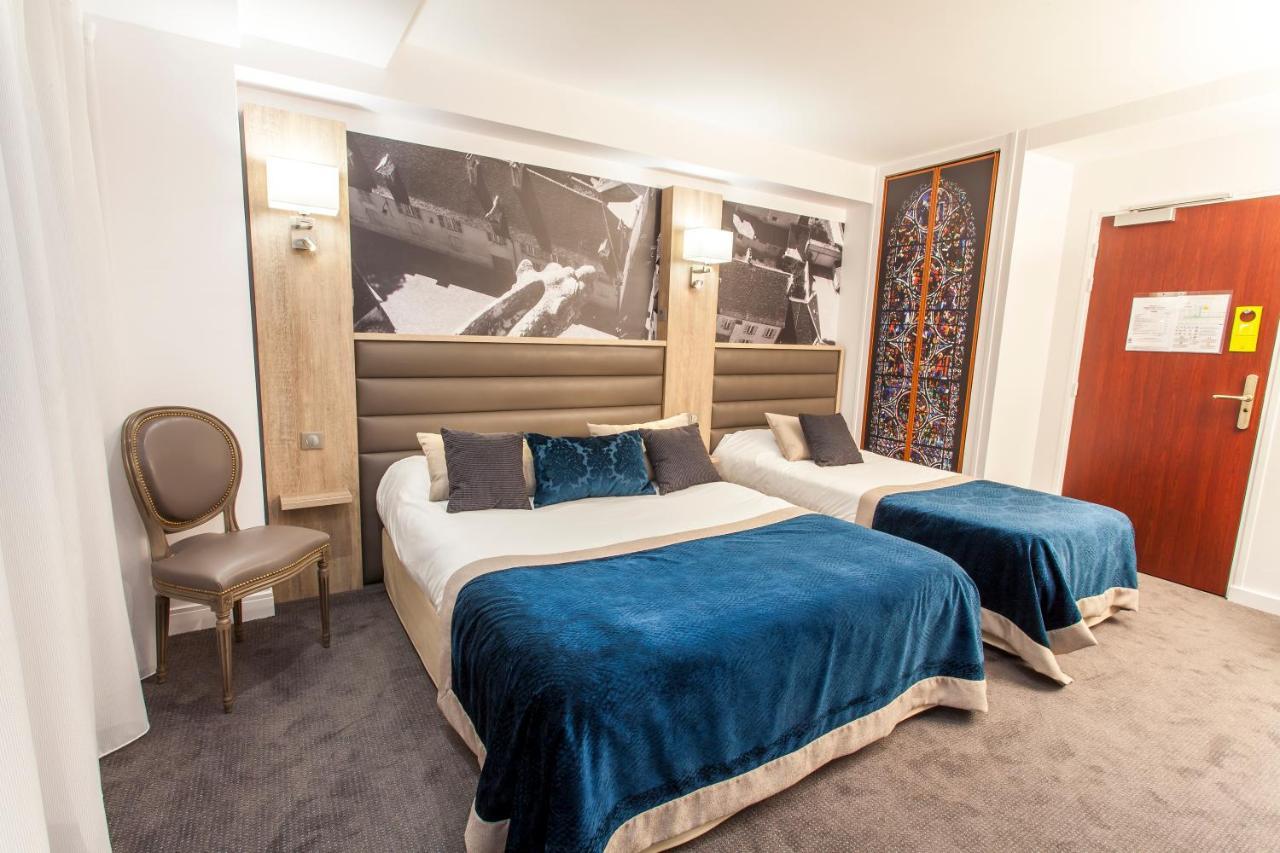 Logis - Le Christina Hotel Bourges Bagian luar foto